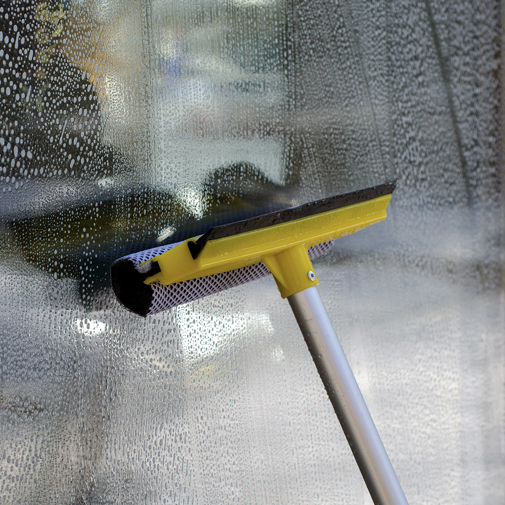Using a squeegee on Window